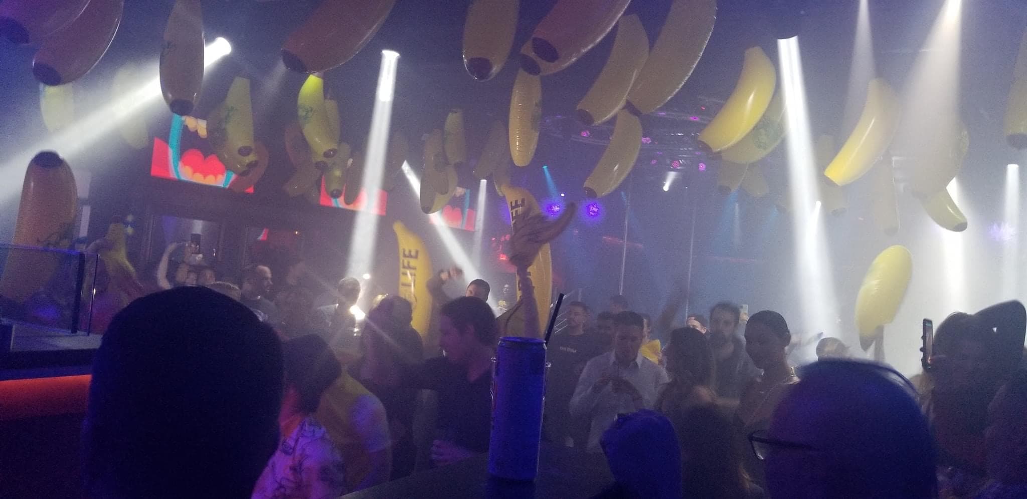Lighting beams cutting through haze above the dance floor at The Gold Room Chicago