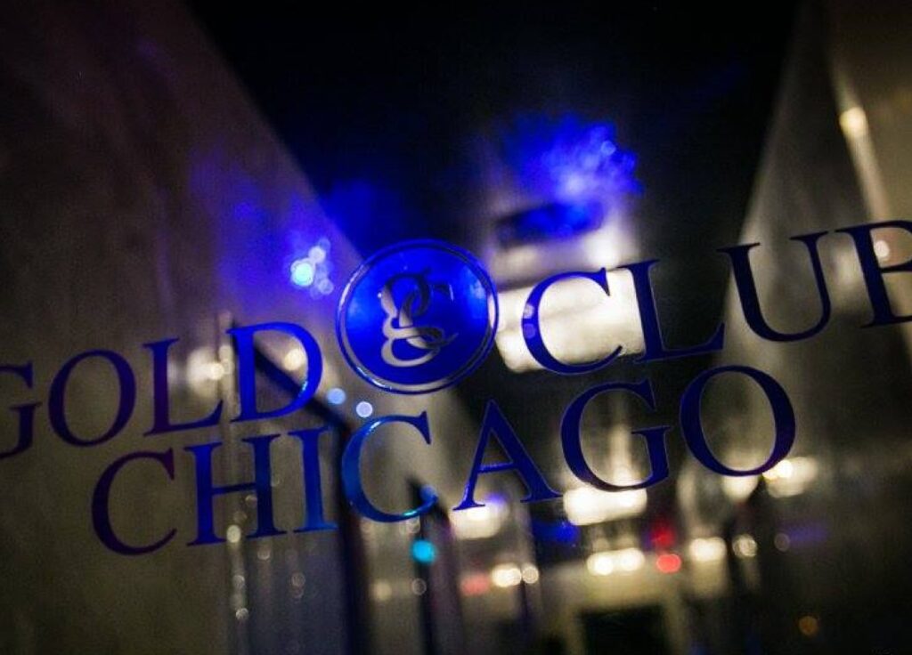 View of the Gold Room Chicago club sign illuminated at night.