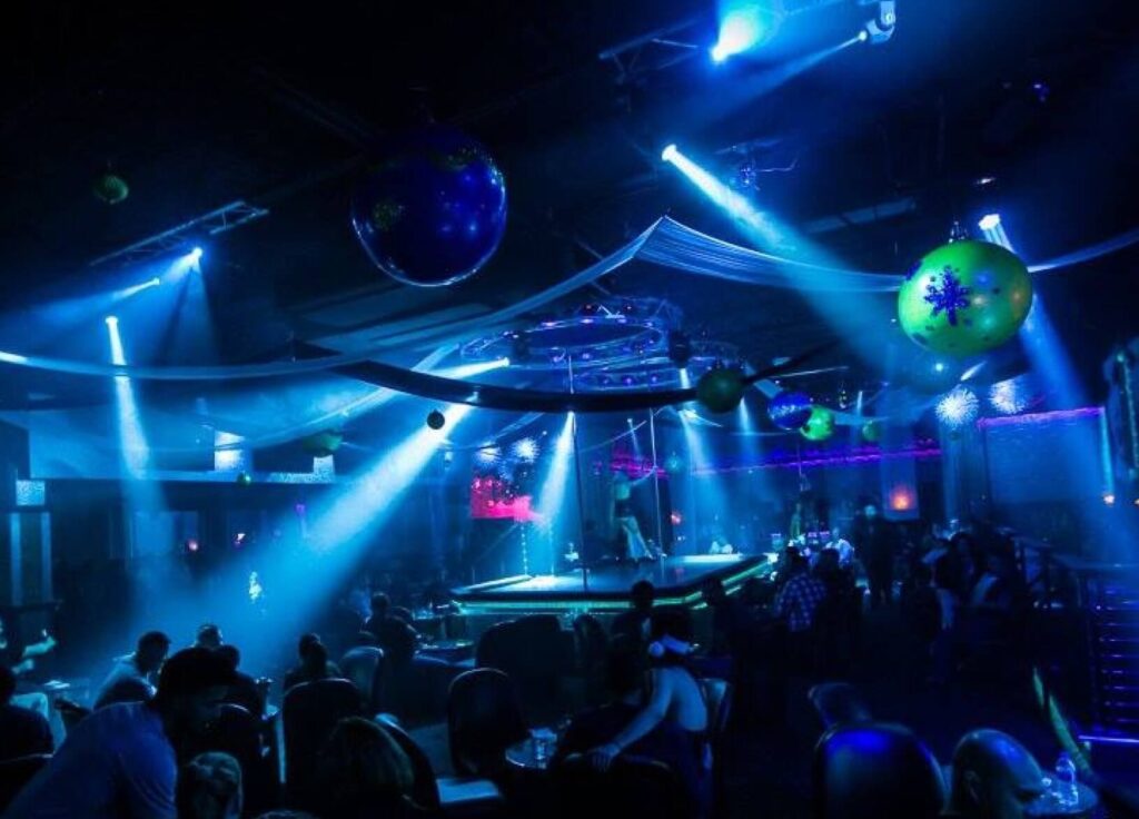 View of the Gold Room Chicago club sign illuminated at night.